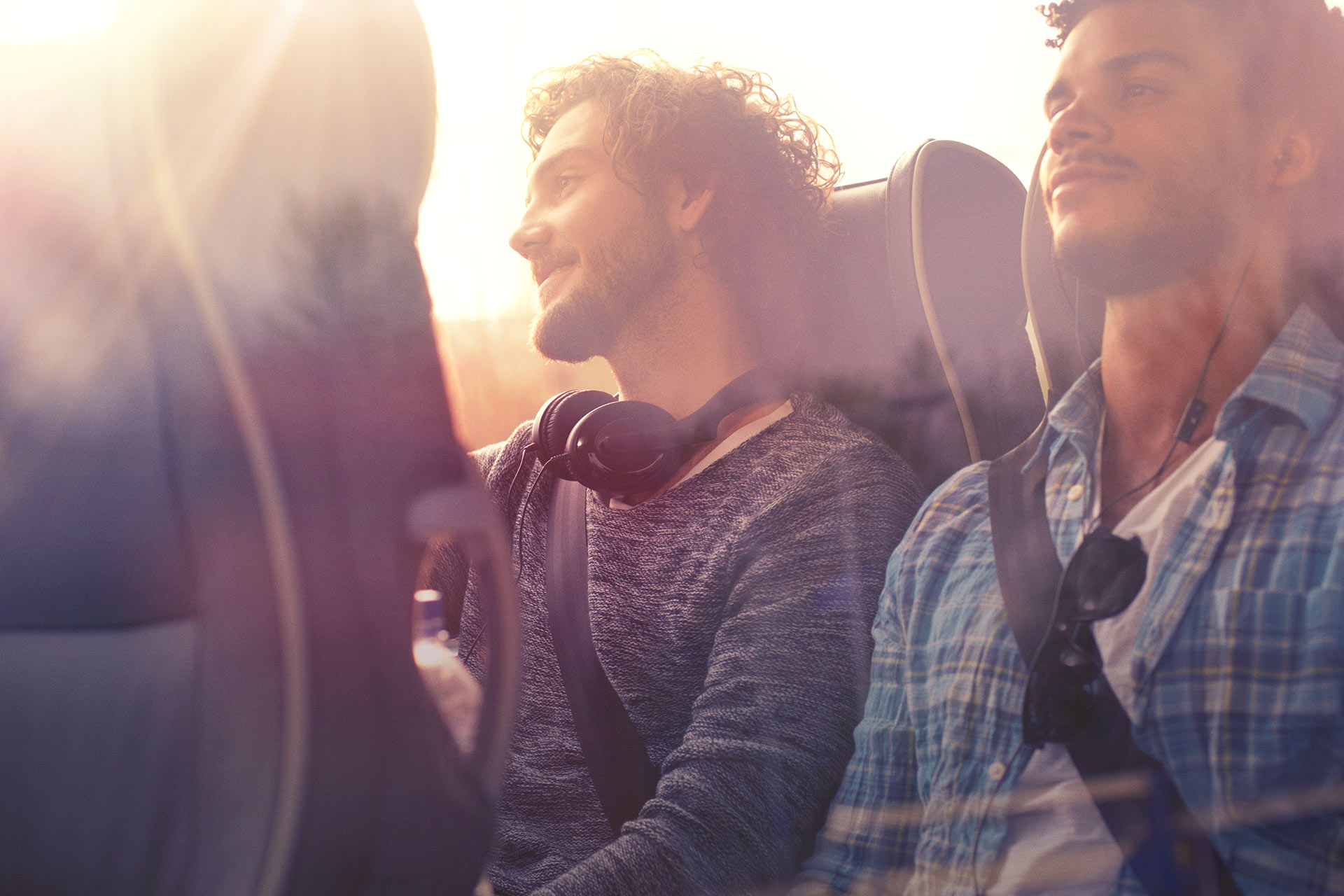 Two men travelling by coach